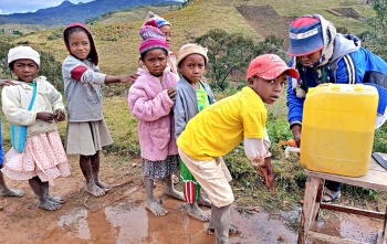 Children in Madagascar washing their hands. 