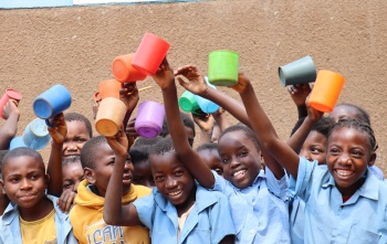 Children celebrating school meals