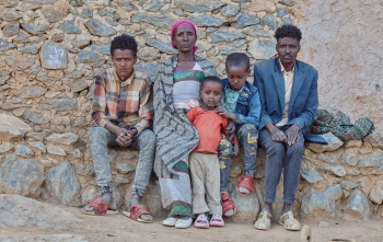 Letemariam and her family looking into the camera.