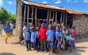 Children together outside their school in Mozampbique