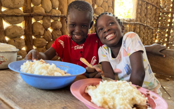 Children eating in Malawi