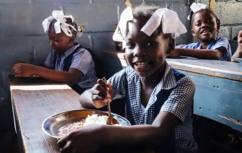 Children eating Mary's Meals in Haiti