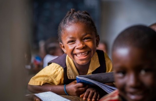 A Liberian child sitting in class gaining an education. 