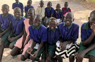 group of boys smiling for the camera