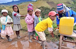 Children in Madagascar washing their hands. 