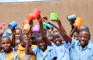 Children celebrating school meals