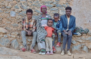 Letemariam and her family looking into the camera.