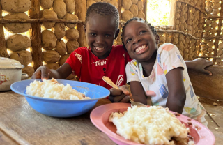 Children eating in Malawi