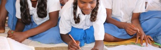 young girls working on their studies