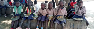 Children eating in South Sudan