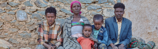 Letemariam and her family looking into the camera.