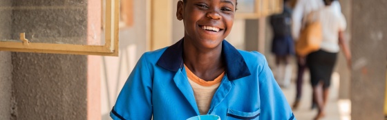 Mary getting on with her studies with the help of Mary's Meals