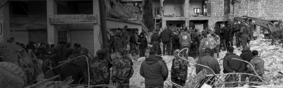 Aid workers attend to survivors of the earthquake in Syria