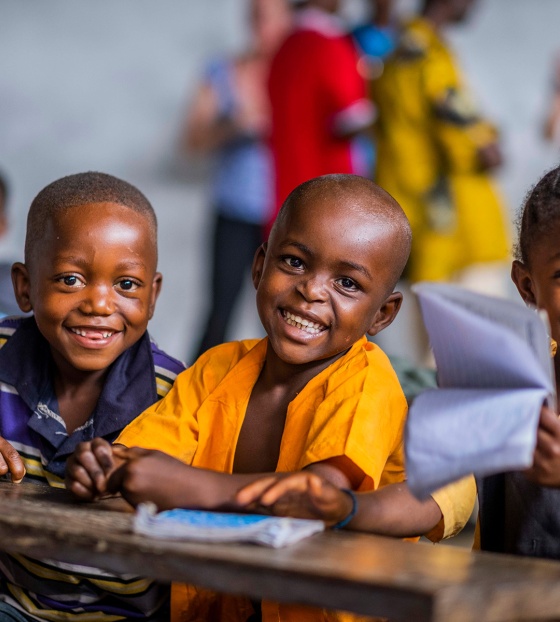 Children smiling in class in Liberia