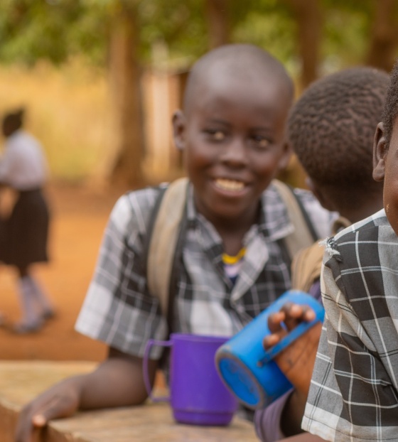 children eating Mary's Meals in Zambia