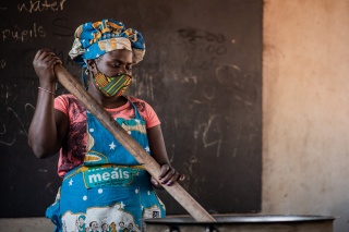 A volunteer cook at Magwero School for the Deaf in Chipata, Eastern Zambia