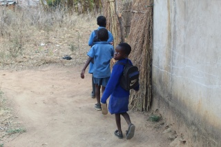 Perpetual's children walking to school