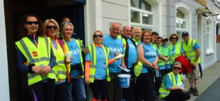 Volunteers collect donations at a Walk to Knock event